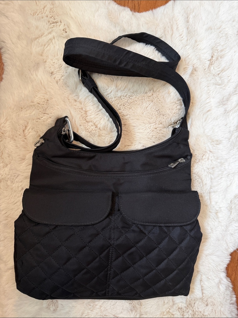Black Quilted Crossbody Bag with Front Flap Pockets